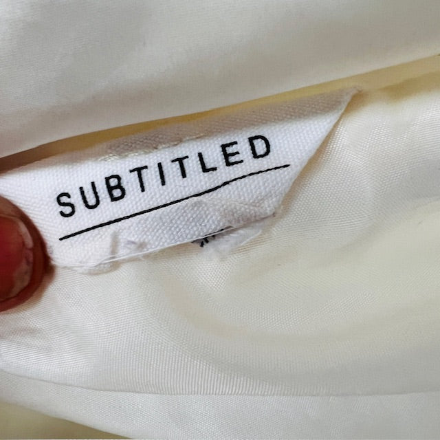 SUBTITLED / oversized white puffer vest / s (3885633189403258989)