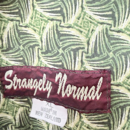 STRANGELY NORMAL / green patterned short sleeve button-up shirt / XL (3926417339600312597)